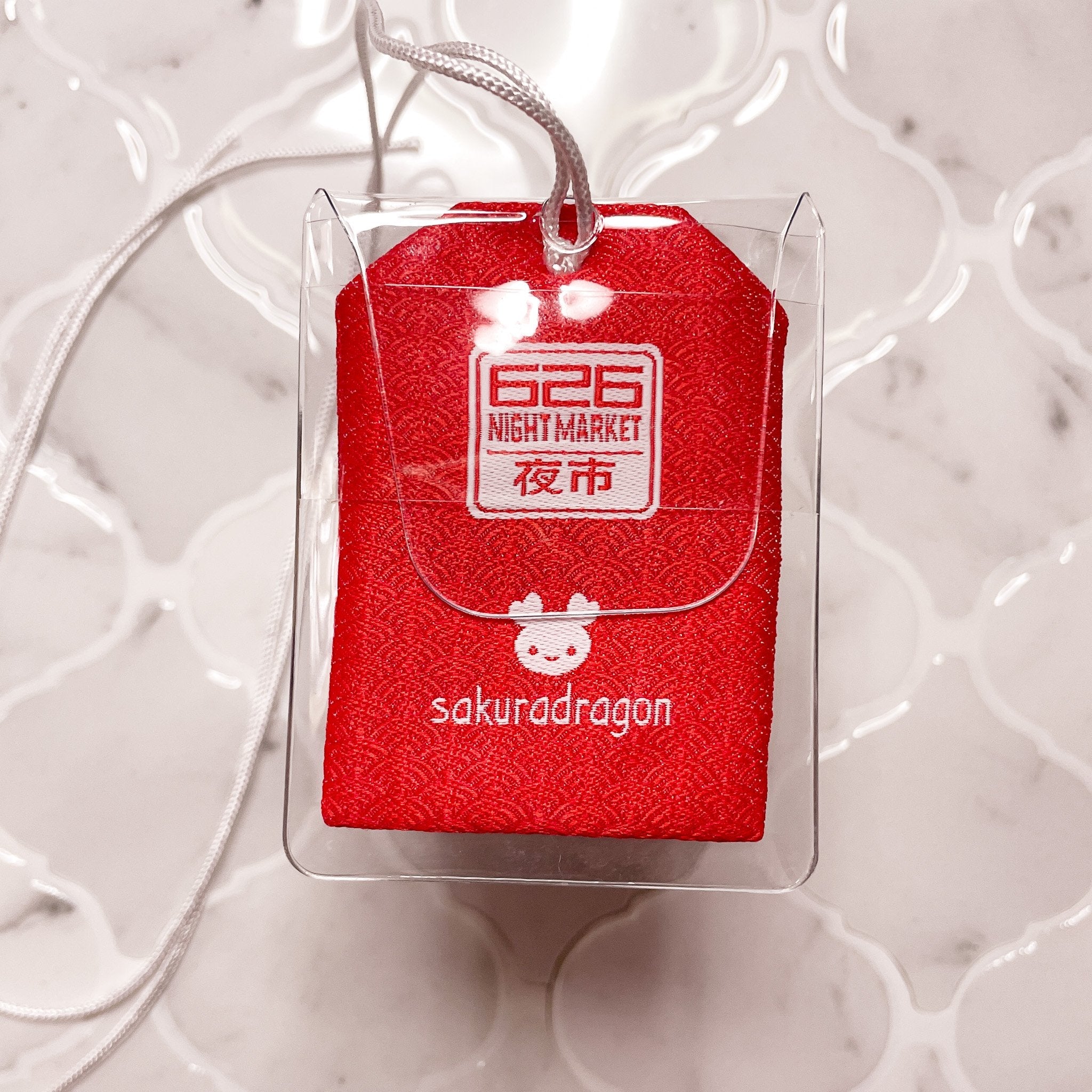 Keychains Pins Omamori Sakuradragon keychains-pins-omamori-sakuradragon